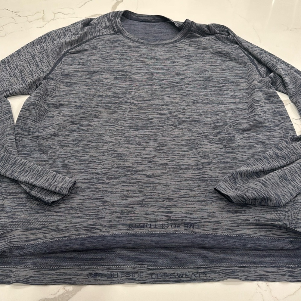 Lululemon. Men’s blue and gray, long sleeved, shirt. Great condition.
